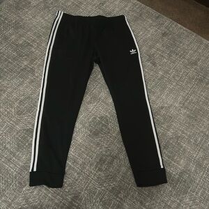 Women’s Adidas Three-stripes pants 
NWT 
XL